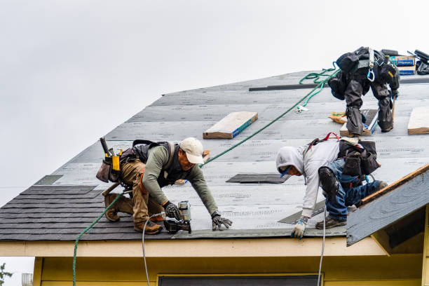 Professional Gutter Installation technician working in Glens Falls, NY